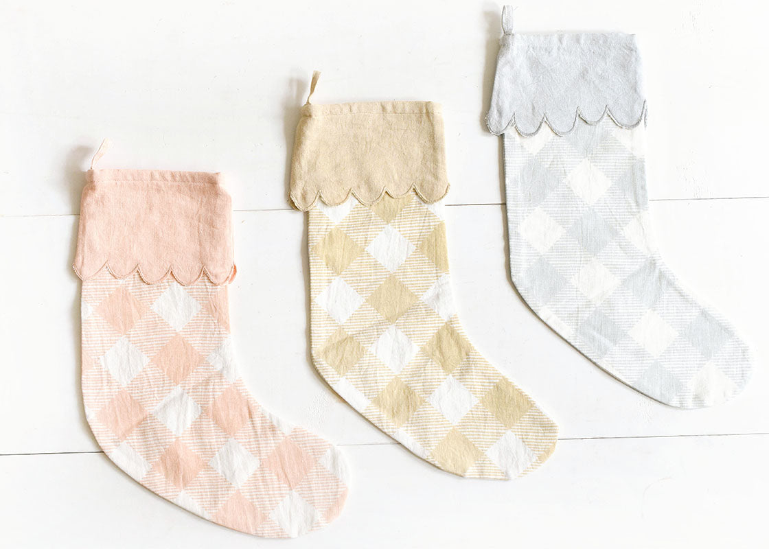 Overhead View of Pastel Colored Buffalo Check Christmas Stockings Including Blue Buffalo Stocking with Trim