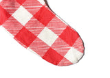 Close up of Red Buffalo Plaid Stocking With Trim