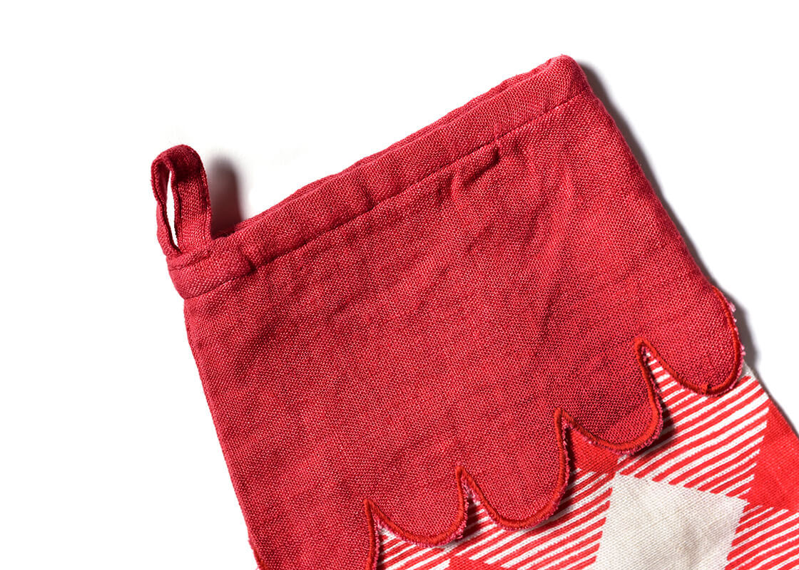 Cropped Close up of Loop Hanger on Red Buffalo Stocking with Trim Showcasing Beautiful Texture of Fabric