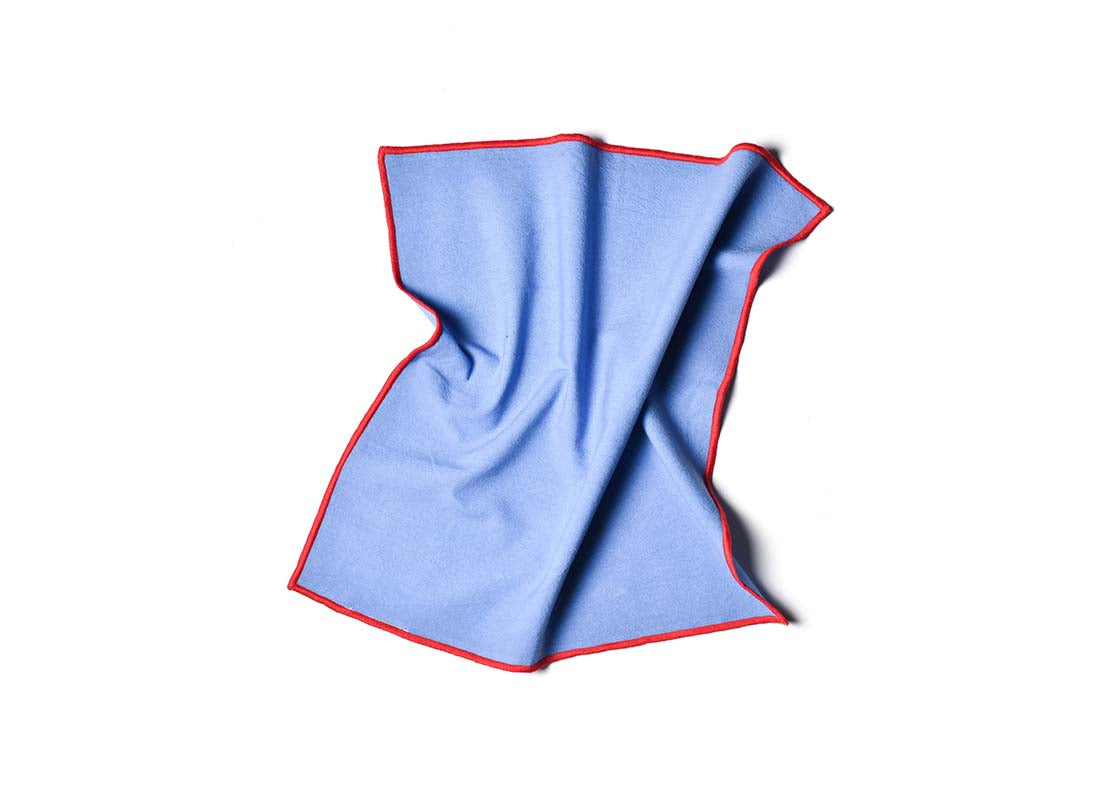 Overhead View of Crumpled Napkin French Blue and Red Color Block Napkin Showcasing Texture and Personality