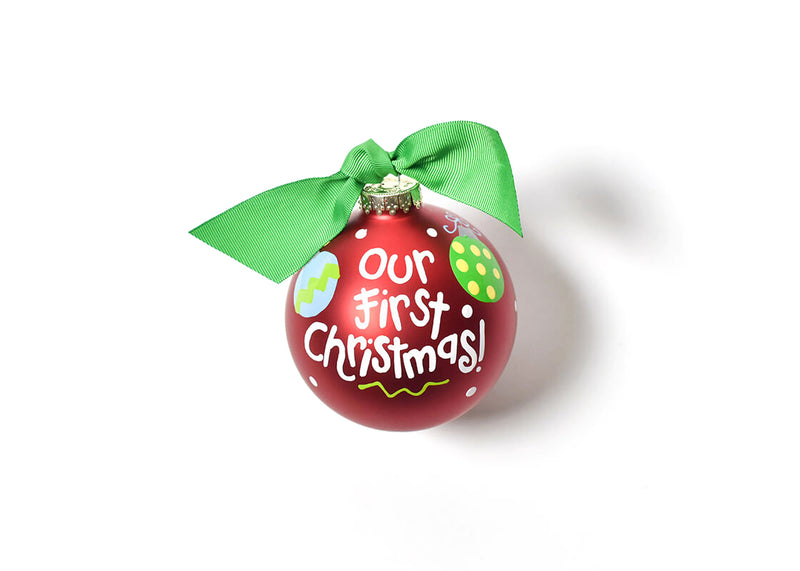 Red Background on Ornament with Green Bow Our First Christmas Design