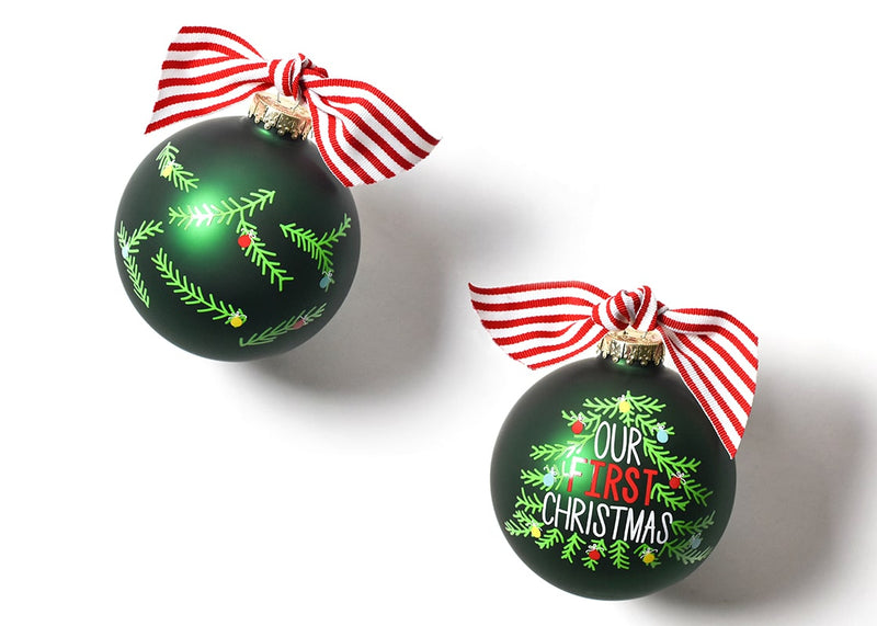 Dark Green Background and Tree Branch Design on Our First Christmas Ornament