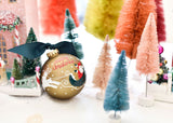 Merry Christmas to All Ornament in Display of Colorful Miniature Trees