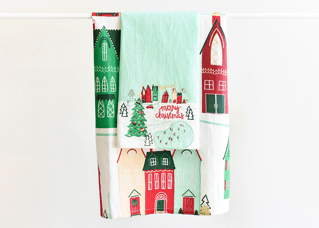 Front View of Folded Christmas Homes Large Hand Towel Layered and Hung on Towel Rod to Inspire