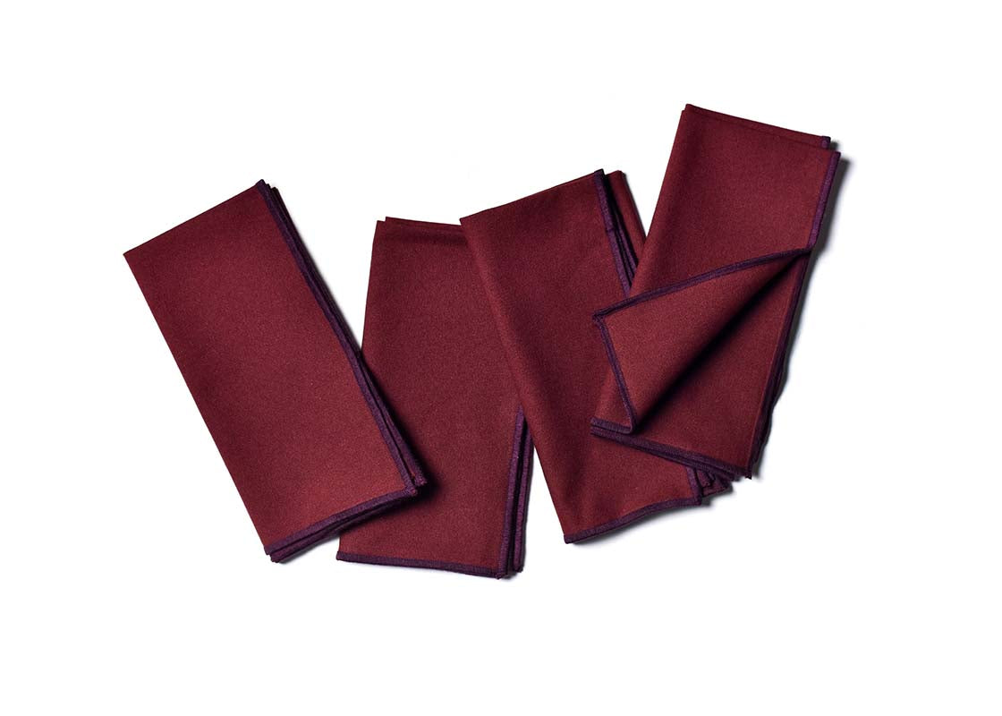 Overhead View of Folded and Creatively Styled Coquette Color Block Napkins Set of 4 Showing Personality of Item