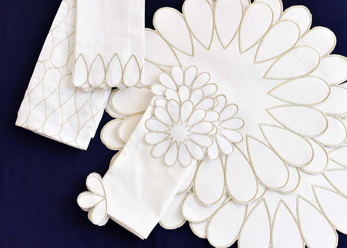 Overhead View of Assorted Metallic Gold Linens including a Deco Gold Scallop Cocktail Napkin