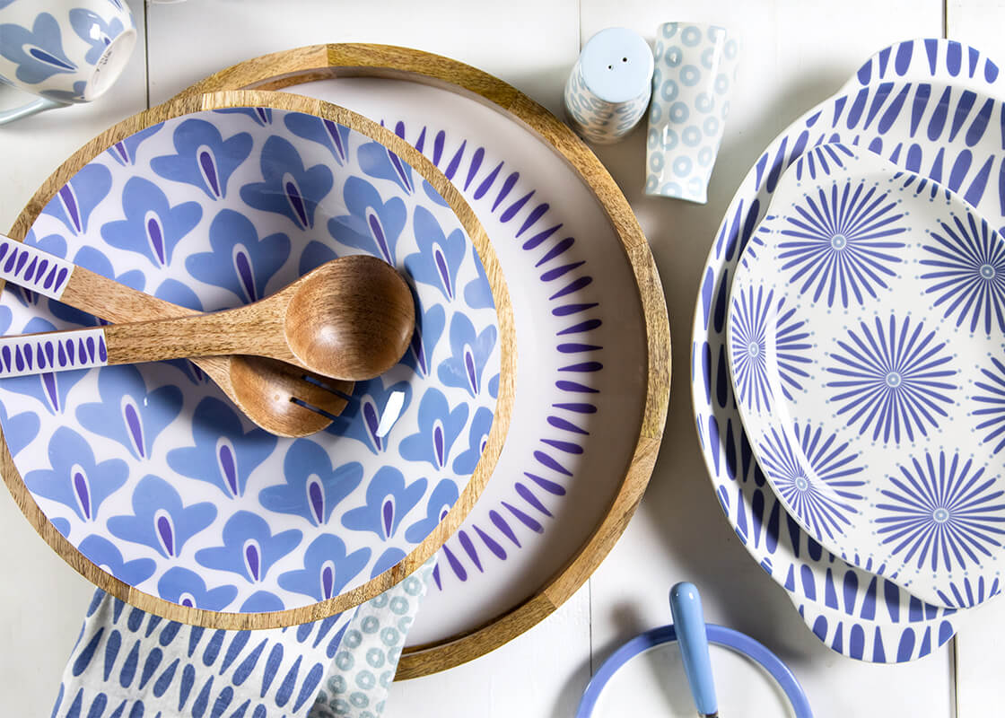 Overhead View of Iris Blue Serveware Designs Including Iris Blue Drop Round Handled Tray