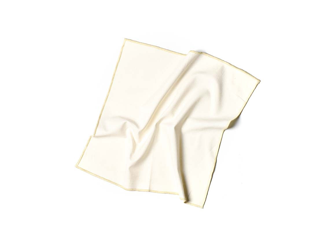 Overhead View of Crumpled Napkin Ecru Color Block Napkin Showcasing Texture and Personality