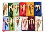 Color Block Napkins with Coordinating Wood Utensil Sets Including Olive Appetizer Fork