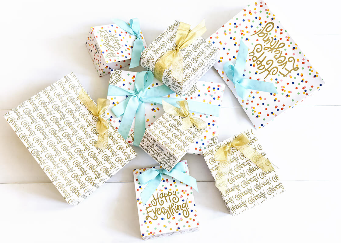 Overhead View of Gift Wrap Collection Includes Celebrate! Small Gift Bag