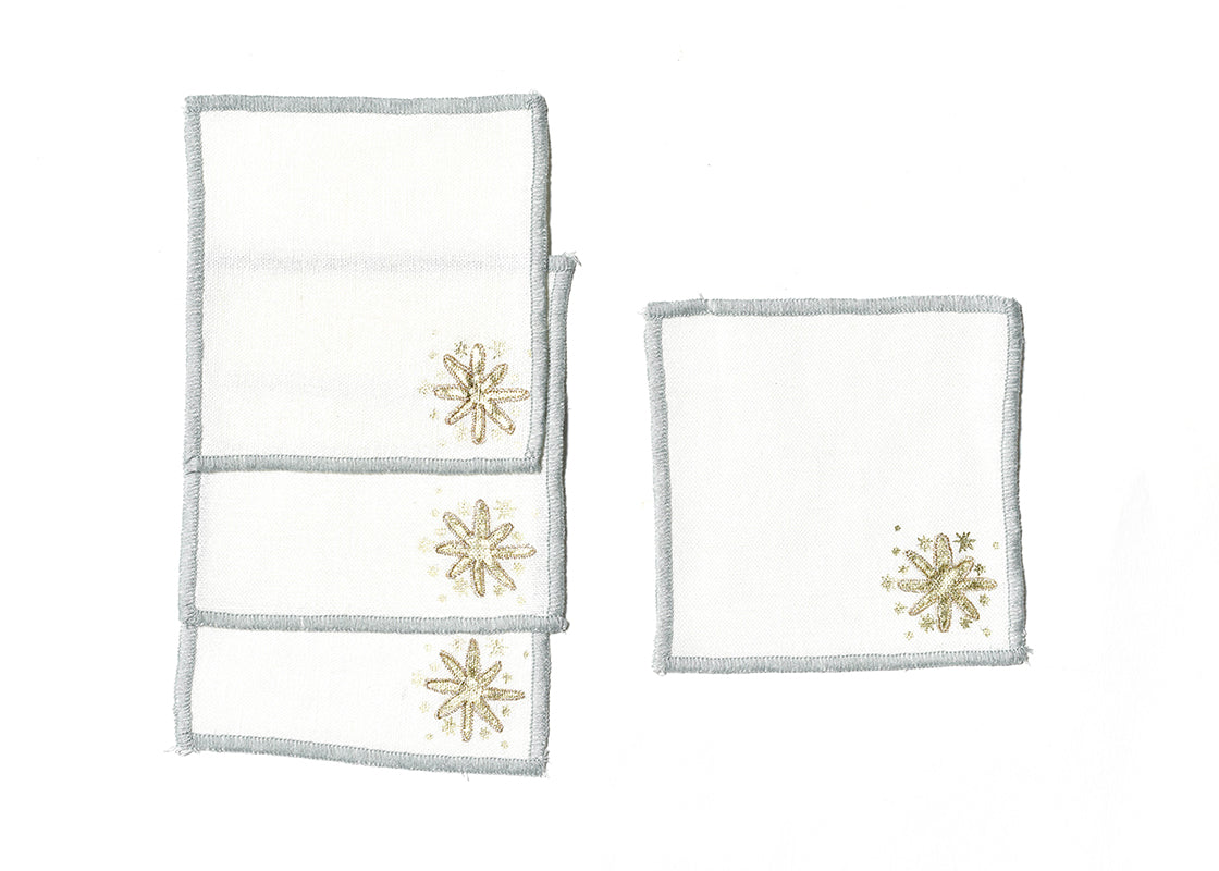 Overhead View of Gold Stars Cocktail Napkin Set of 4 Showing all Pieces in Set