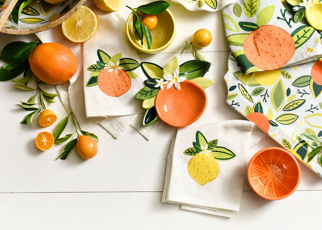 Overhead View of Citrus Designs Including Lemon Hand Towel