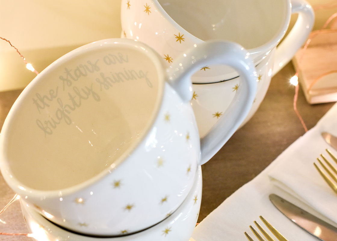 Front View of Close up of Script Writing Inside Religious Nativity Mug