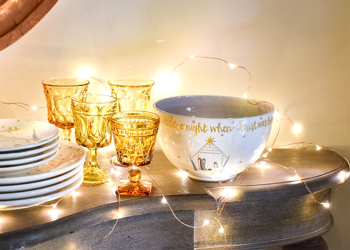 Front View of Sparkly Table Setting with O Holy Night Neutral Nativity 9” Footed Bowl