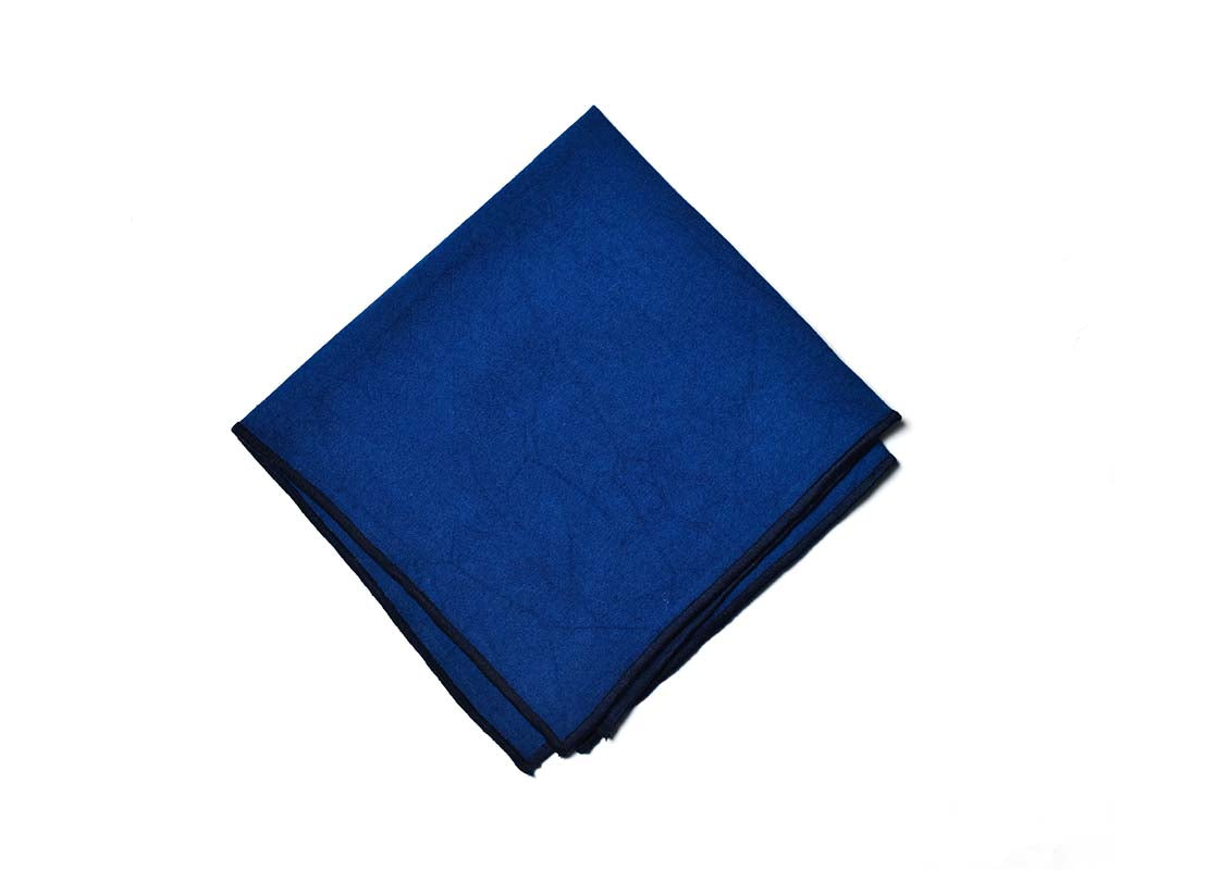 Overhead View of Folded Square Navy Color Block Napkin Showcasing Closer Look at Design Details