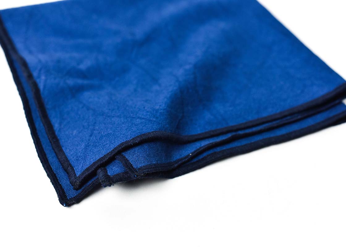 Cropped Close up of Navy Hem Stitched Trim on Folded Navy Color Block Napkins Set of 4 Showcasing Beautiful Texture of Fabric