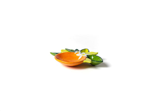 Green Leaves and White Flower Compliment Orange Tray