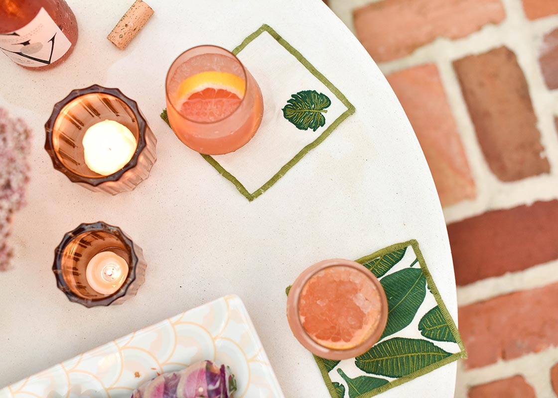 Overhead View of Palm Cocktail Napkins Placed at Individual Placesettings