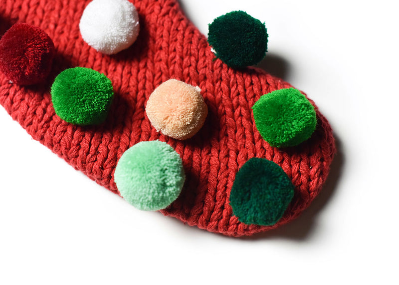 Colorful Pom Poms on the Toe Section of Christmas Stocking Christmas in the Village Design
