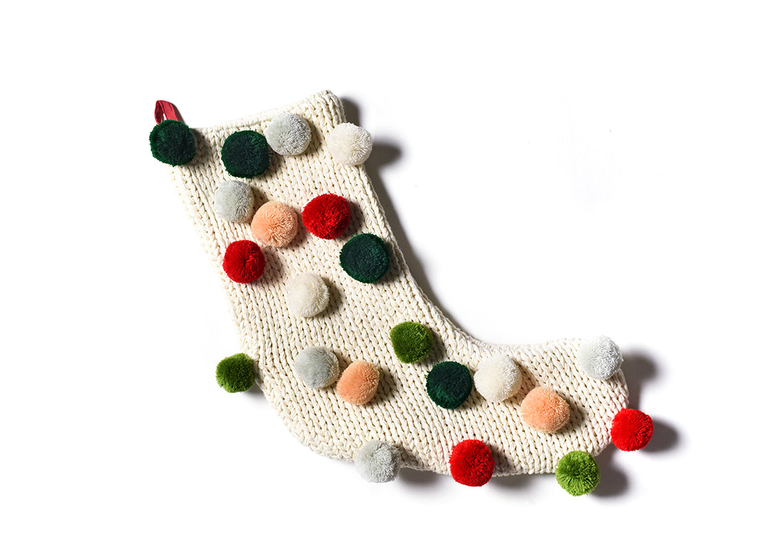 Overhead View of Ecru Knit Stocking with Pom Poms