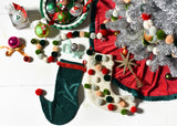 Seasonal Decor Including Christmas Knit Stocking wtih Pom Poms