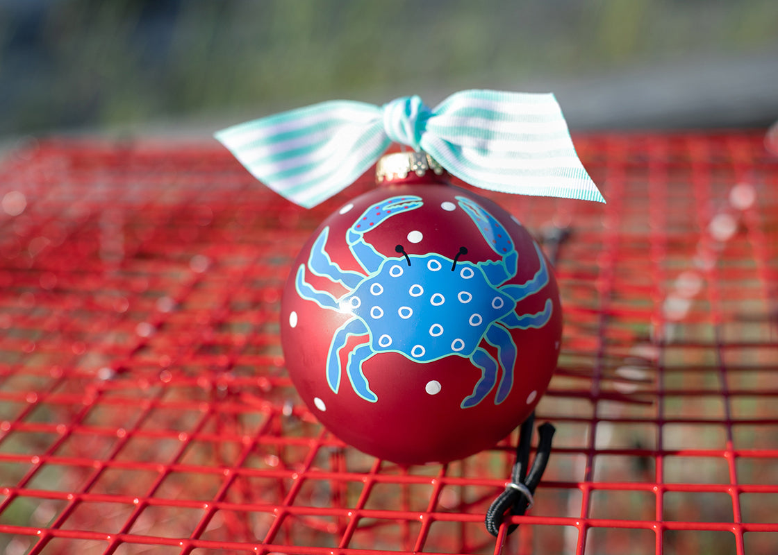 Front View of Festive Decoration Crab Ornament Red Glass with White Dots Placed on Crab Trap