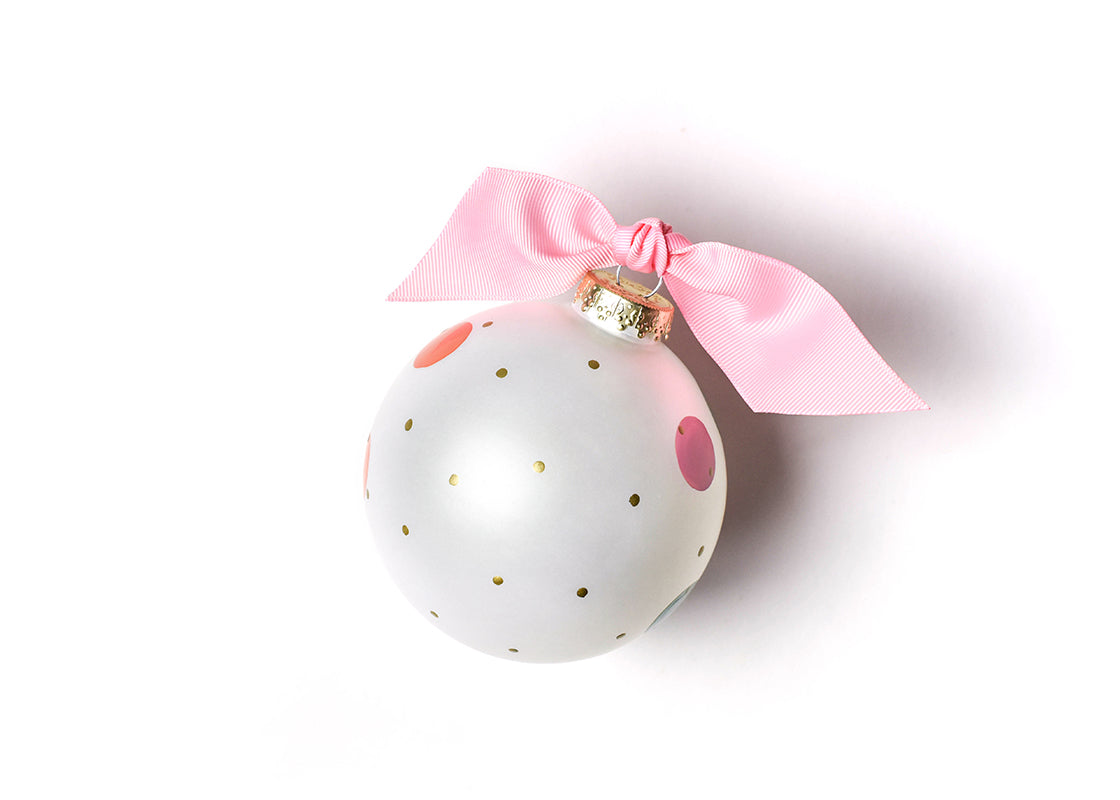 Overhead View of White Ornament Best Aunt Ever Design on Pink Fabric Background