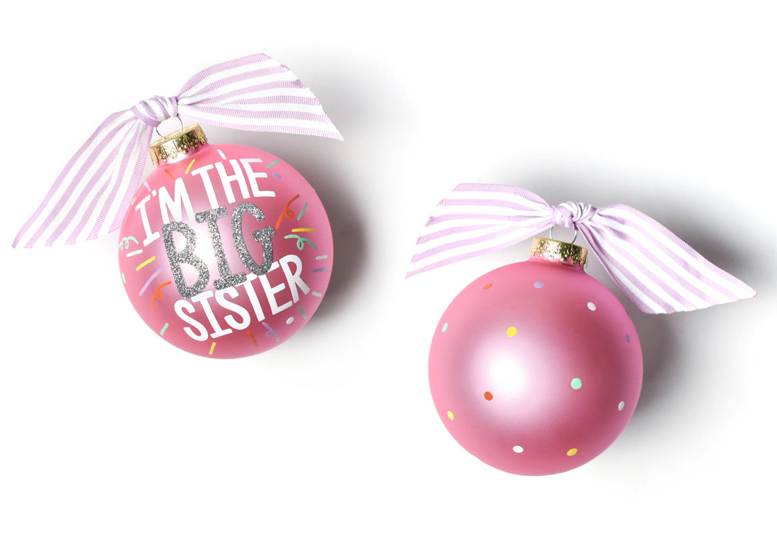 Front and Back View of Big Sister Popper Glass Ornament Placed Side by Side