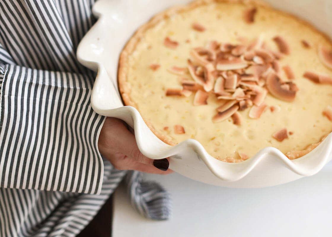 Overhead View of Pumpkin Pie Baked in Signature White 9in Ruffle Pie Dish