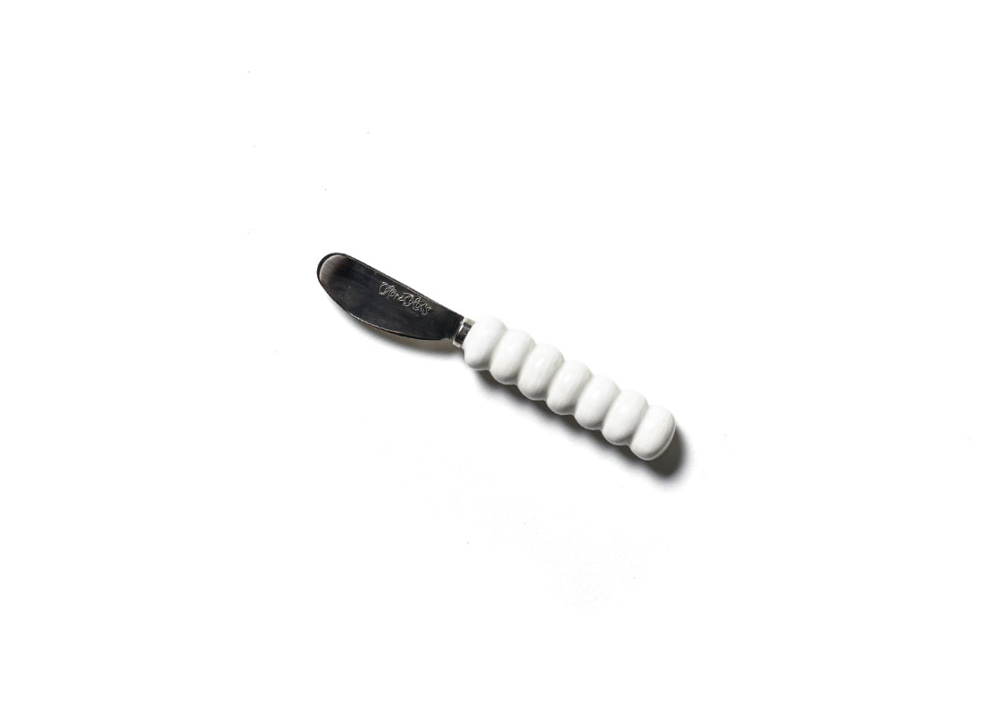 Overhead View of Signature White Knob Spreader Showcasing Unique Shape of Handle