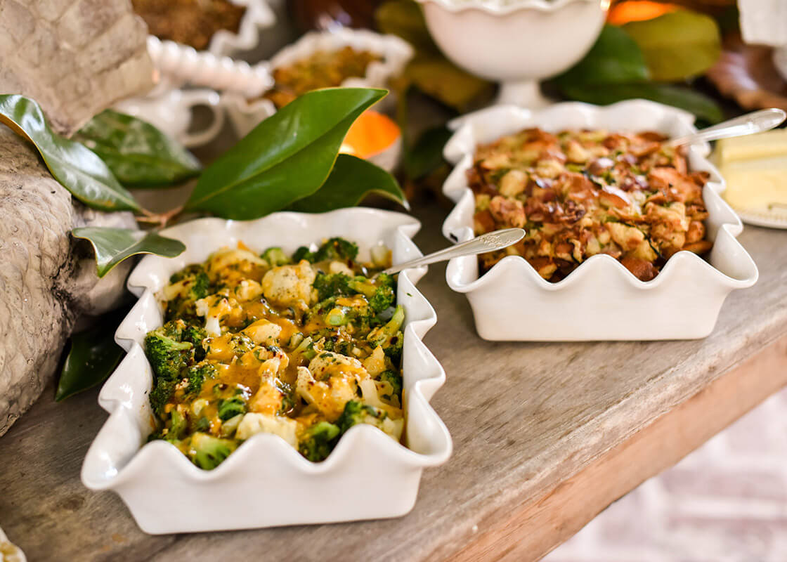 Side View of Signature White 13in Ruffle Casseroles set on Thanksgiving Buffet Table