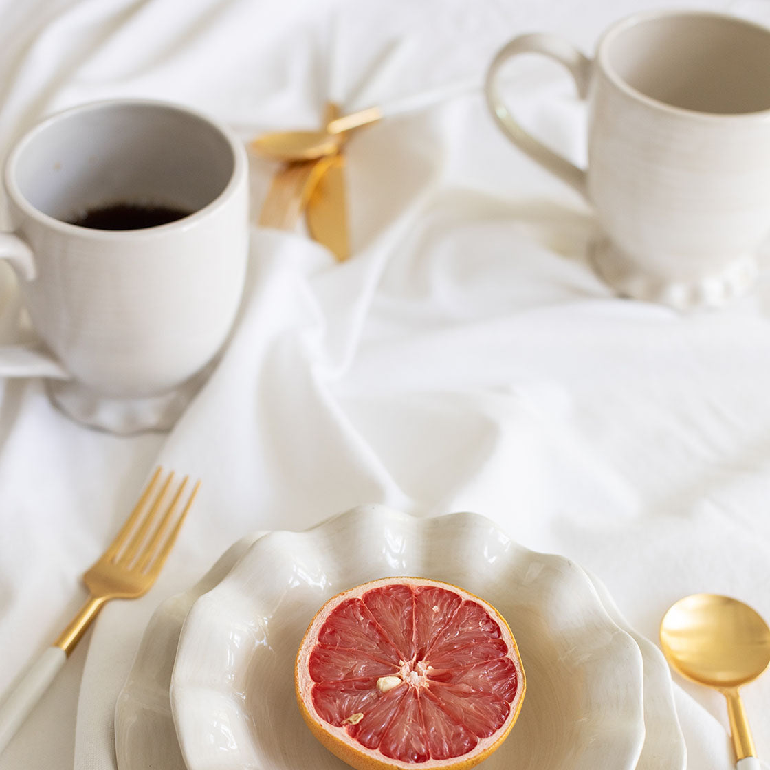 Overhead View of Ruffle Mugs Coordinated with Signature White Serveware in Breakfast Tablescape