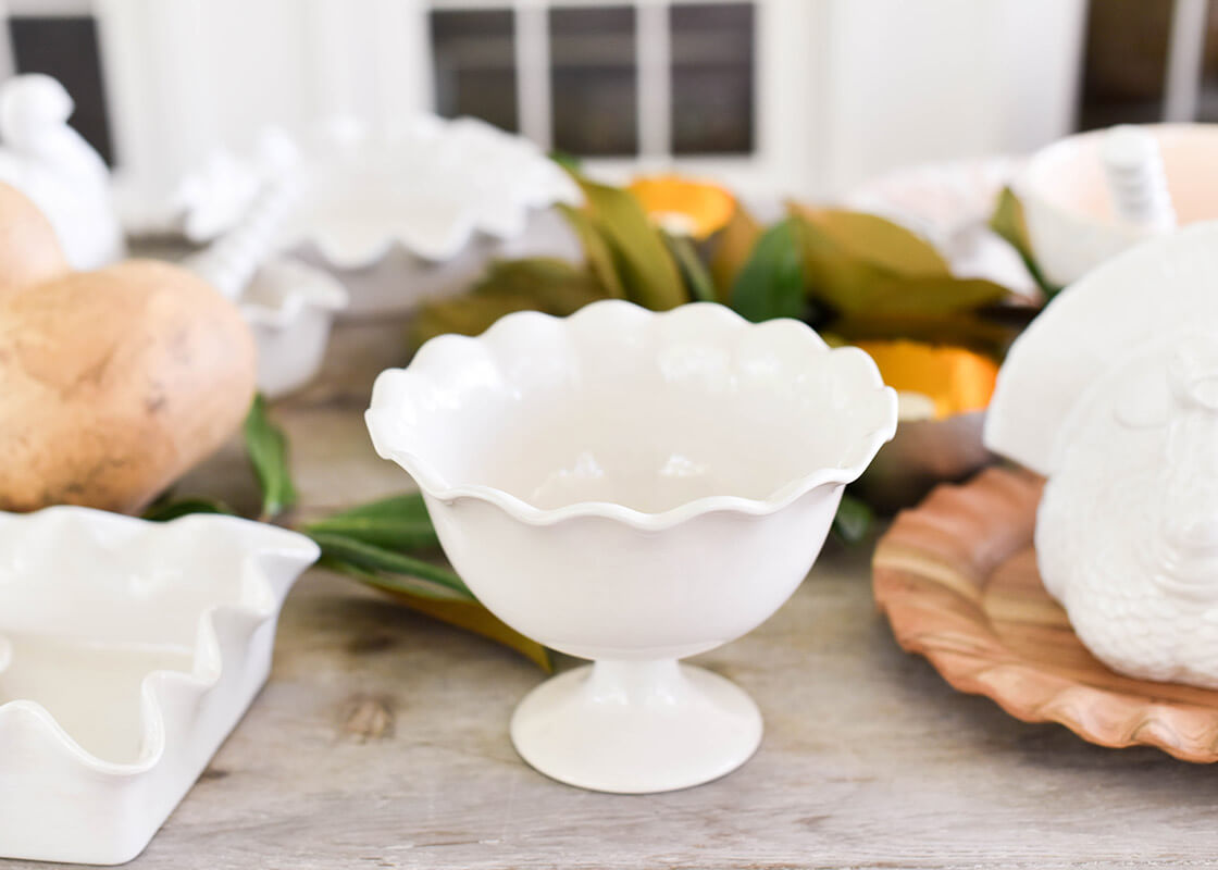 Front View of Coton Colors Serveware Including Signature White Ruffle Trifle Bowl