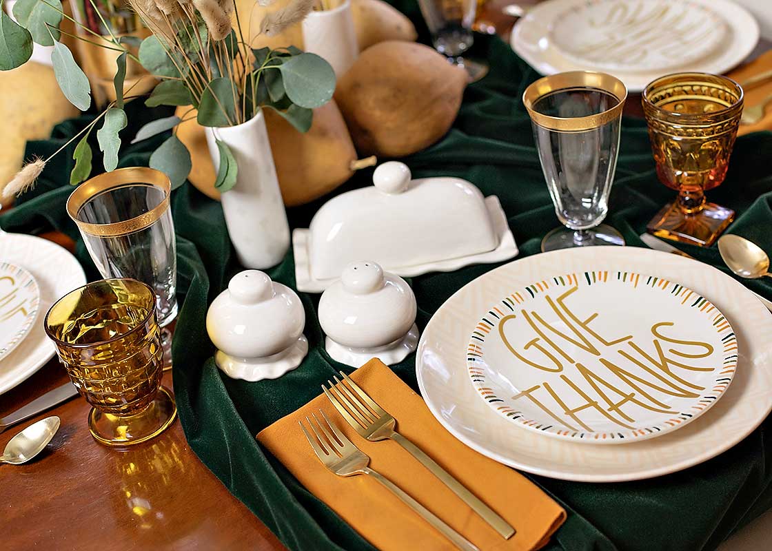 Front View of Seasonal Tablescape Featuring Ruffle Design in Signature White Including Domed Butter Dish