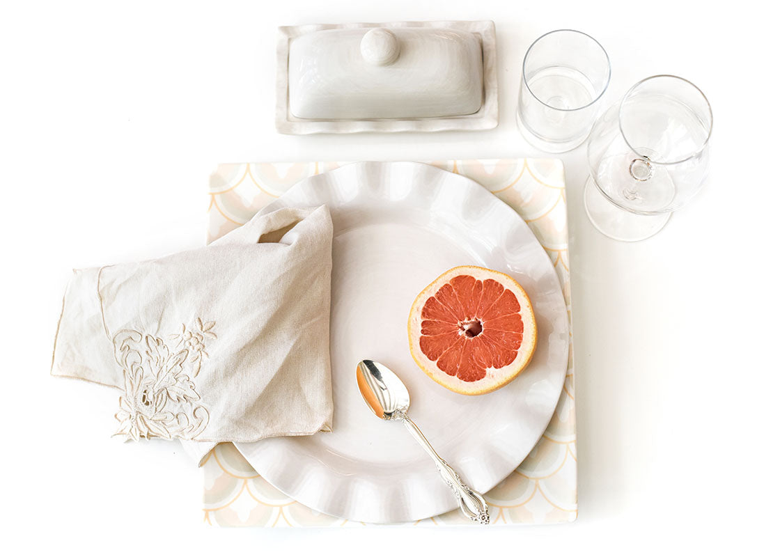 Overhead View of Tablescape Including Signature White Butter Dish Ruffle Design