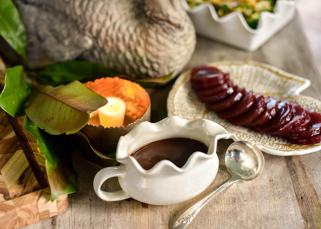 Front View of Serveware on Thanksgiving Buffet Including Signature White Ruffle Gravy Boat