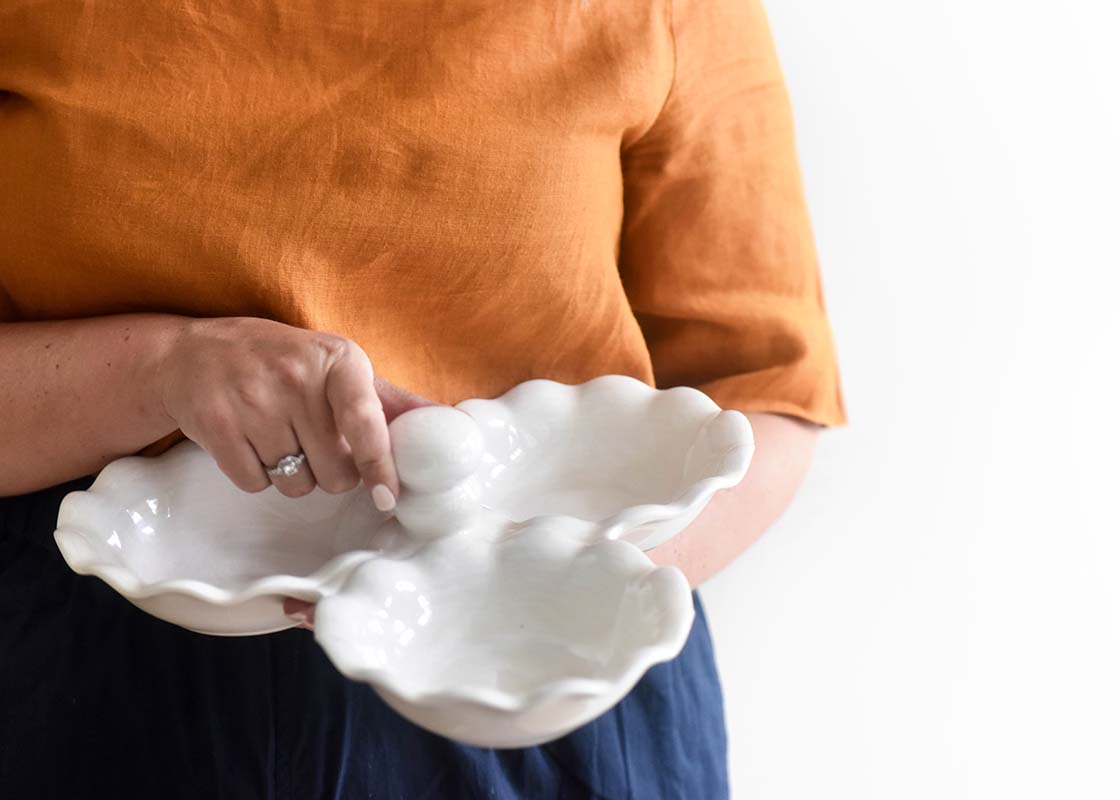 Front View of Woman Holding Signature White Three Bowl Server