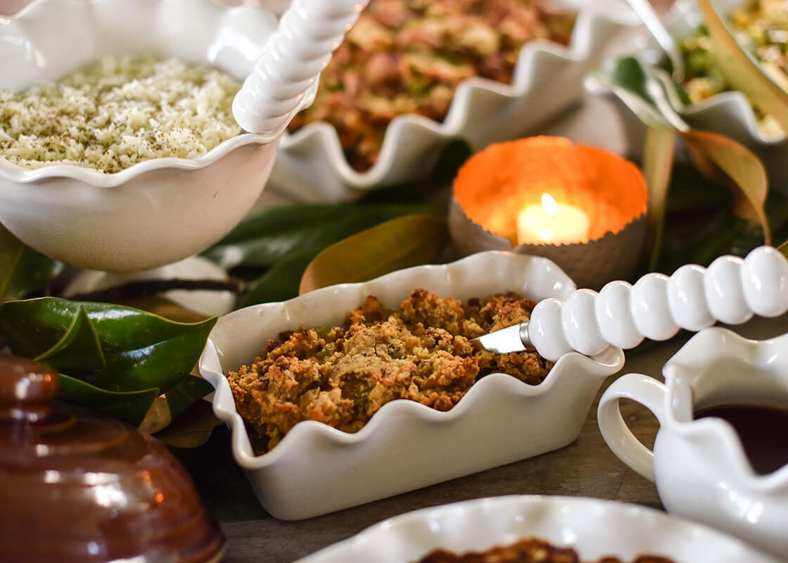 Extreme Cropped Close up of Serveware including Signature White Ruffle Loaf Pan Filled with Thanksgiving Favorites