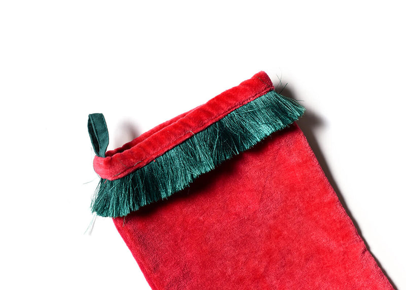 Close Up of Pine Green Trim on Christmas Stocking Red Velvet