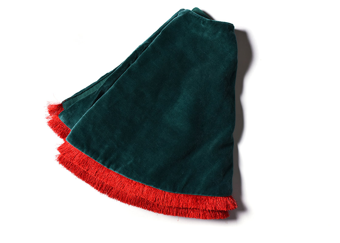 Overhead View of Folded Pine Velvet Tree Skirt with Trim Showing Closer View of Design Details