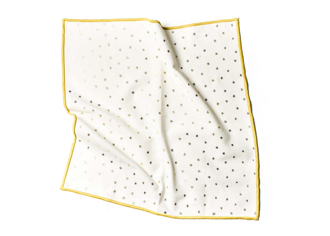Overhead View of Crumpled Napkin Gold Stars Napkin Showcasing Texture and Personality