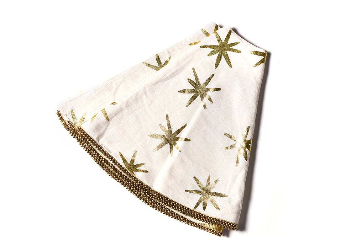 Overhead View of Folded Gold Stars Tree Skirt with Beaded Trim Showing Closer View of Design Details