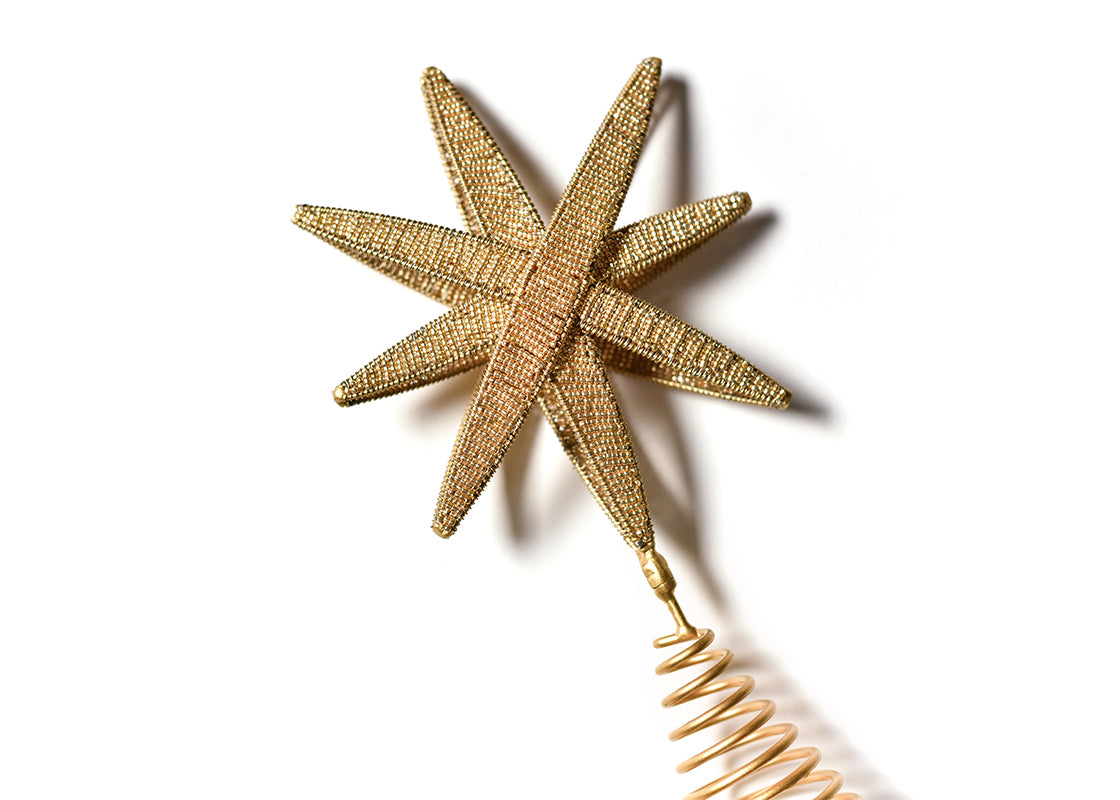 Cropped Close up of Detailed Spiral Holder of Gold Beaded Star Small Tree Topper