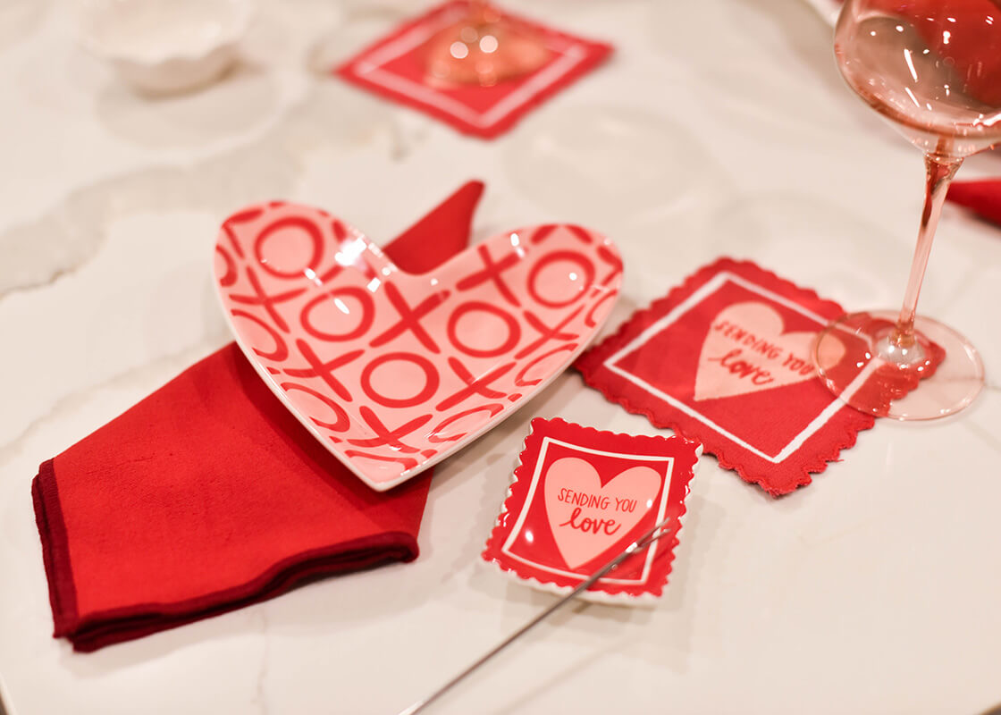 Cropped Close up of Stamp of Love Trinket Dish in Individual Valentine's Day Dinner Placesetting