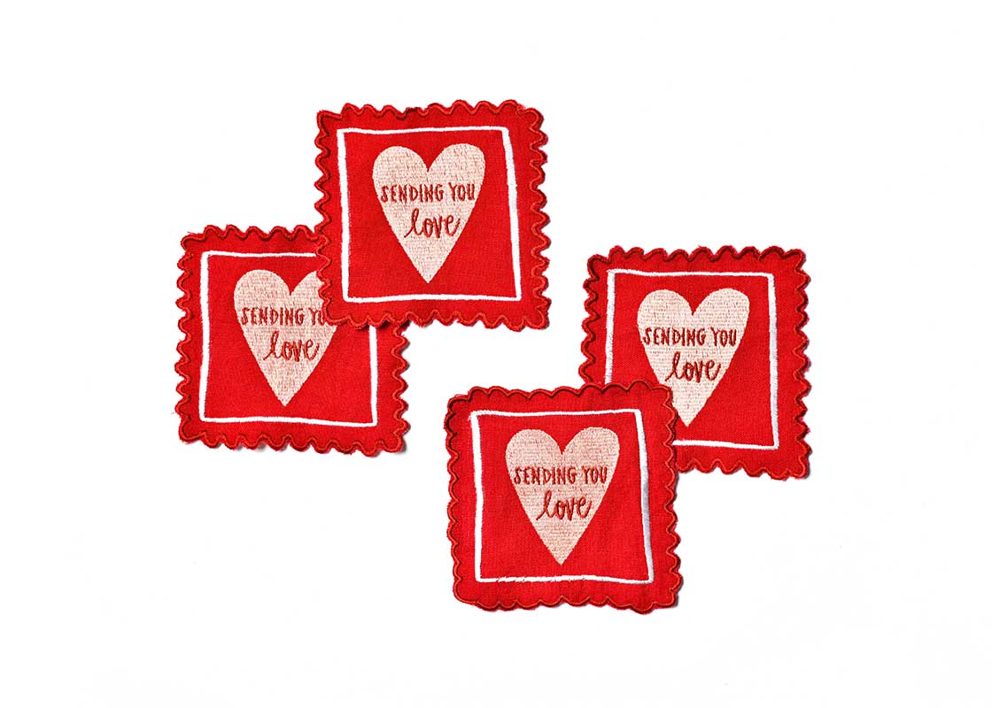 Overhead View of Creatively Placed Stamp of Love Cocktail Napkins Set of 4 Showing all Pieces in Set and Personality