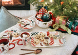Tablescape with Stockings Design Serveware Beside Christmas Tree