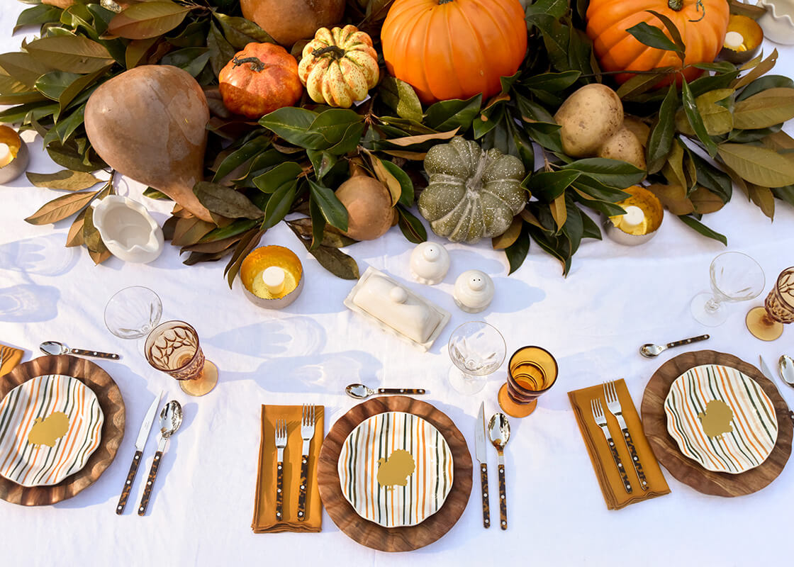 Overhead View of Individual Thanksgiving Place Settings Including Turkey Stripes Ruffle Salad Plate