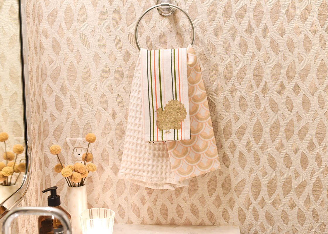 Front View of Turkey Stripes Medium Hand Towel Layered and Hanging on Towel Holder in Bathroom