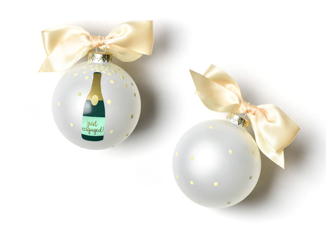 Front and Back View of Just Engaged Champagne Pop Glass Ornament Placed Side by Side