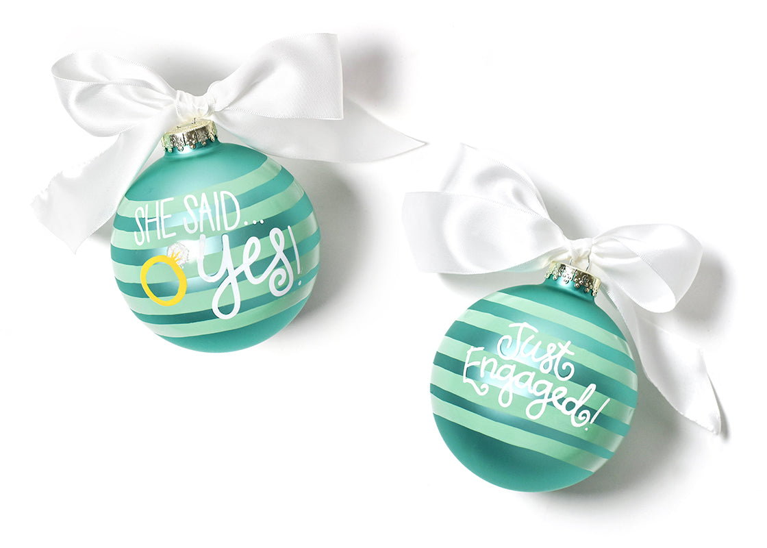 Front and Back View of She Said Yes Just Engaged Glass Ornament Placed Side by Side